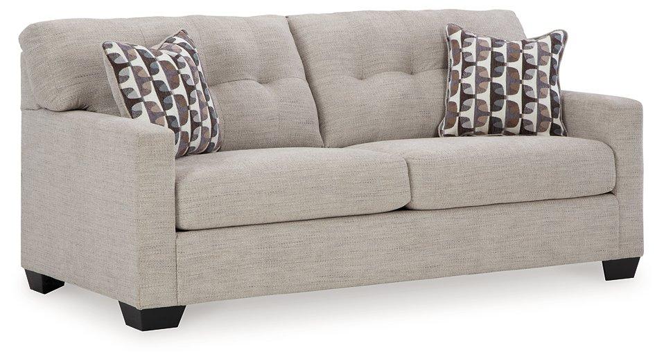 Mahoney sofa by Ashley Furniture featuring plush cushions and modern design in a neutral fabric for stylish living room seating.