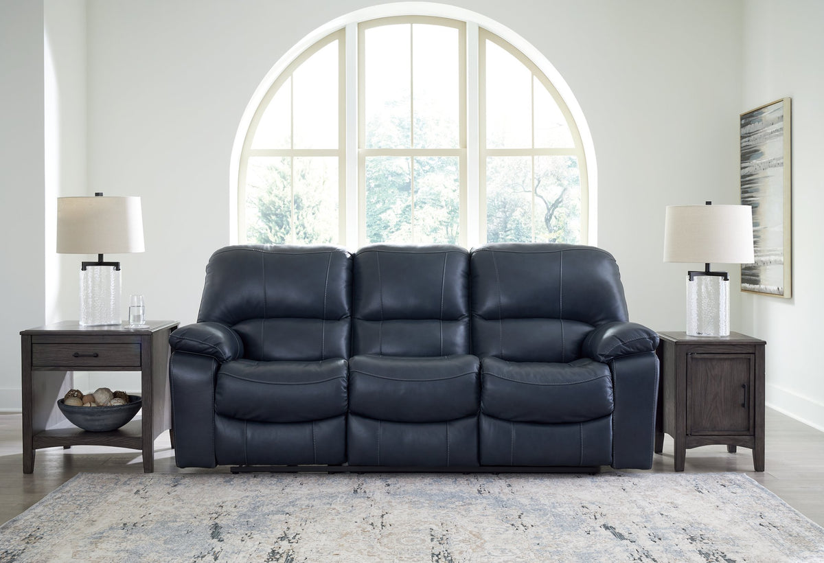 Ashley Furniture Leesworth power reclining sofa with plush cushions and fabric upholstery, shown in a closed reclined position.