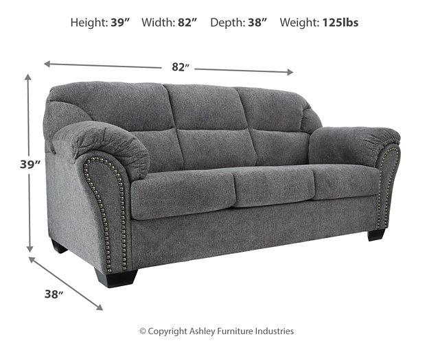 Ashley Furniture Allmaxx sofa with plush cushions and neutral fabric, shown in a stylish living room setting.