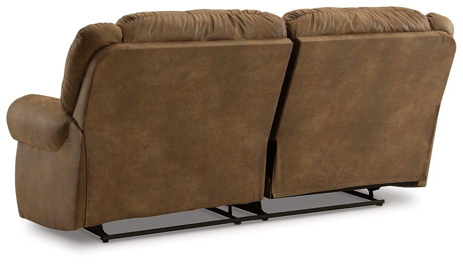 Ashley Furniture Boothbay Power Reclining Sofa with plush cushions and reclining features, shown in a cozy living room setting.
