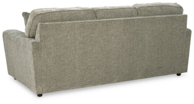 Ashley Furniture Cascilla sofa with plush back cushions and sleek design, shown from the rear view.