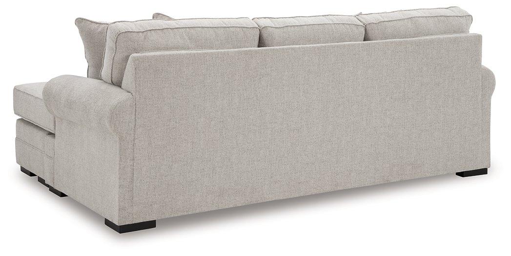 Ashley Furniture Eastonbridge sofa chaise with plush fabric, featuring a spacious design and comfortable back cushions.