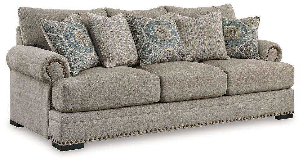 Ashley Furniture Galemore Sofa with plush cushions and neutral fabric, showcasing a modern, comfortable living room piece.