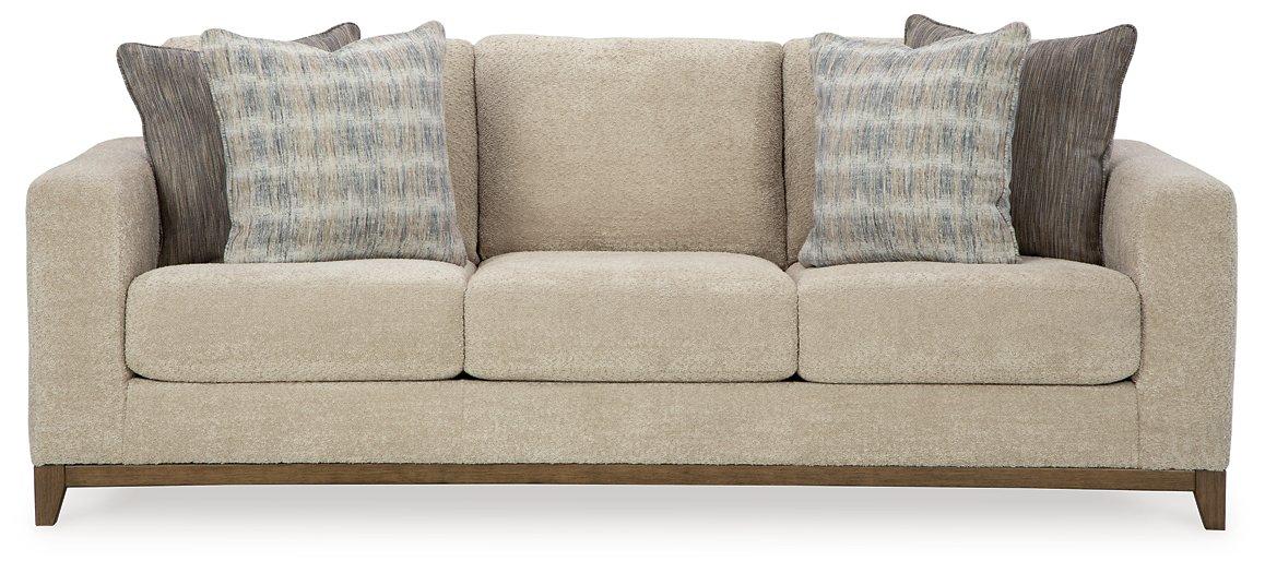 Ashley Furniture Parklynn sofa with plush cushions and modern design, shown in a cozy living room setting.