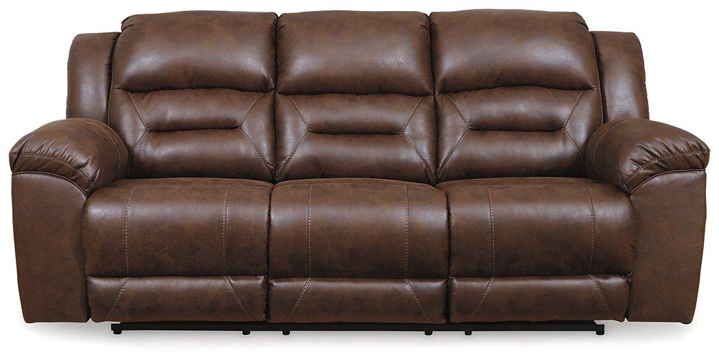 Ashley Furniture Stoneland power reclining sofa with plush cushions and recliner features, showcasing a modern, comfortable living room piece.