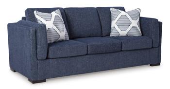 Ashley Furniture Evansley sofa with plush cushions and neutral fabric, showcasing a modern living room style.