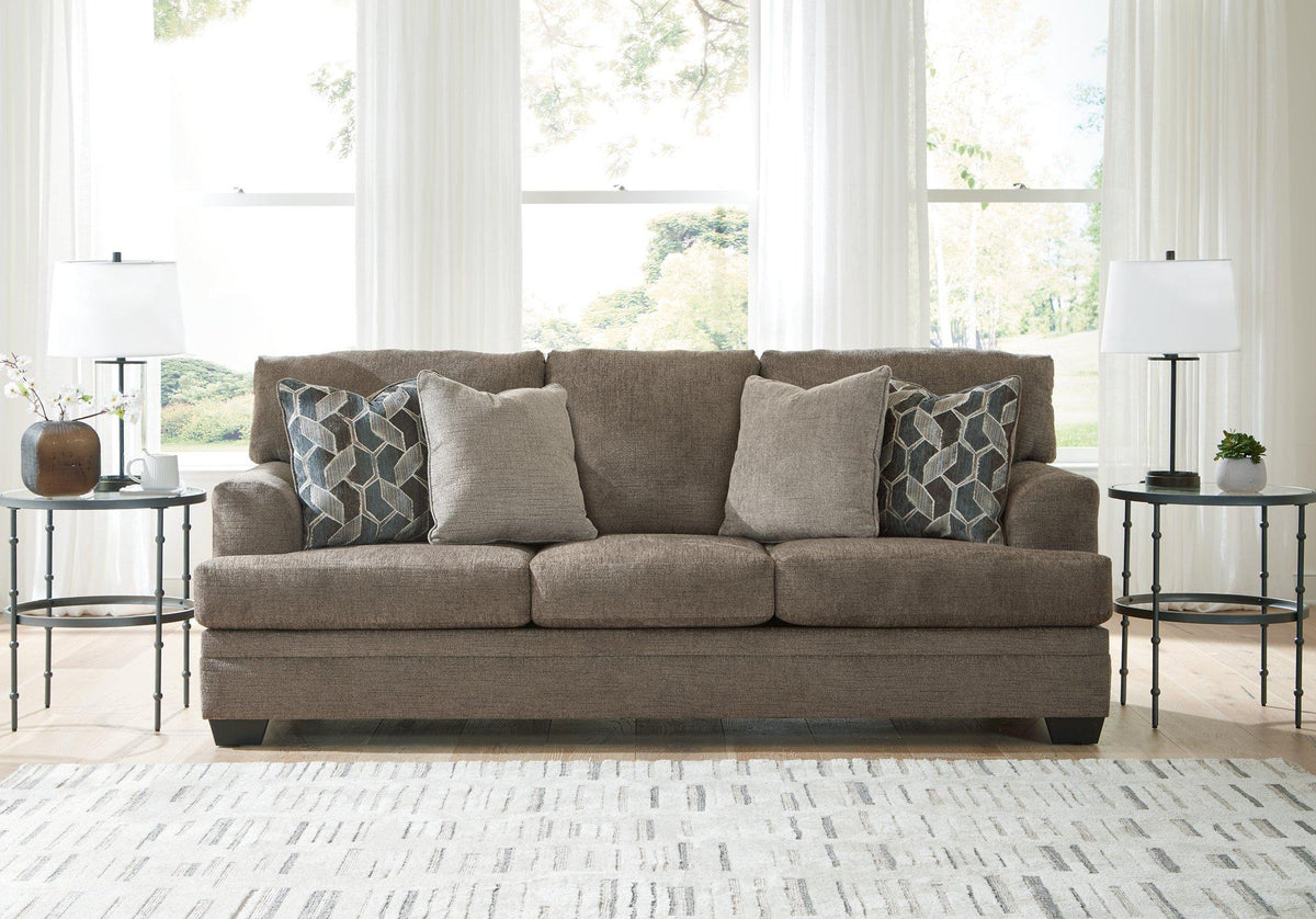 Ashley Furniture Stonemeade sofa with plush cushions and neutral fabric, showcasing a modern, comfortable living room piece.