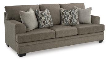 Ashley Furniture Stonemeade sofa with plush cushions and neutral fabric, shown in a modern living room setting.