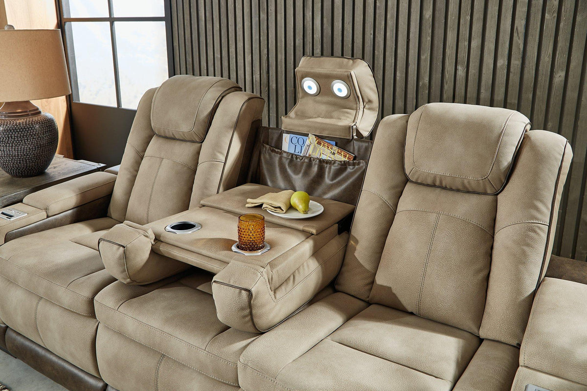 Ashley Furniture Next-Gen DuraPella Power Reclining Sofa with plush upholstery and reclining features, shown from a front angle.