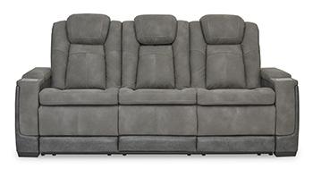 Next-Gen DuraPella Power Reclining Sofa by Ashley Furniture, showing plush cushioned seats and recliner mechanisms in a modern living room setting.
