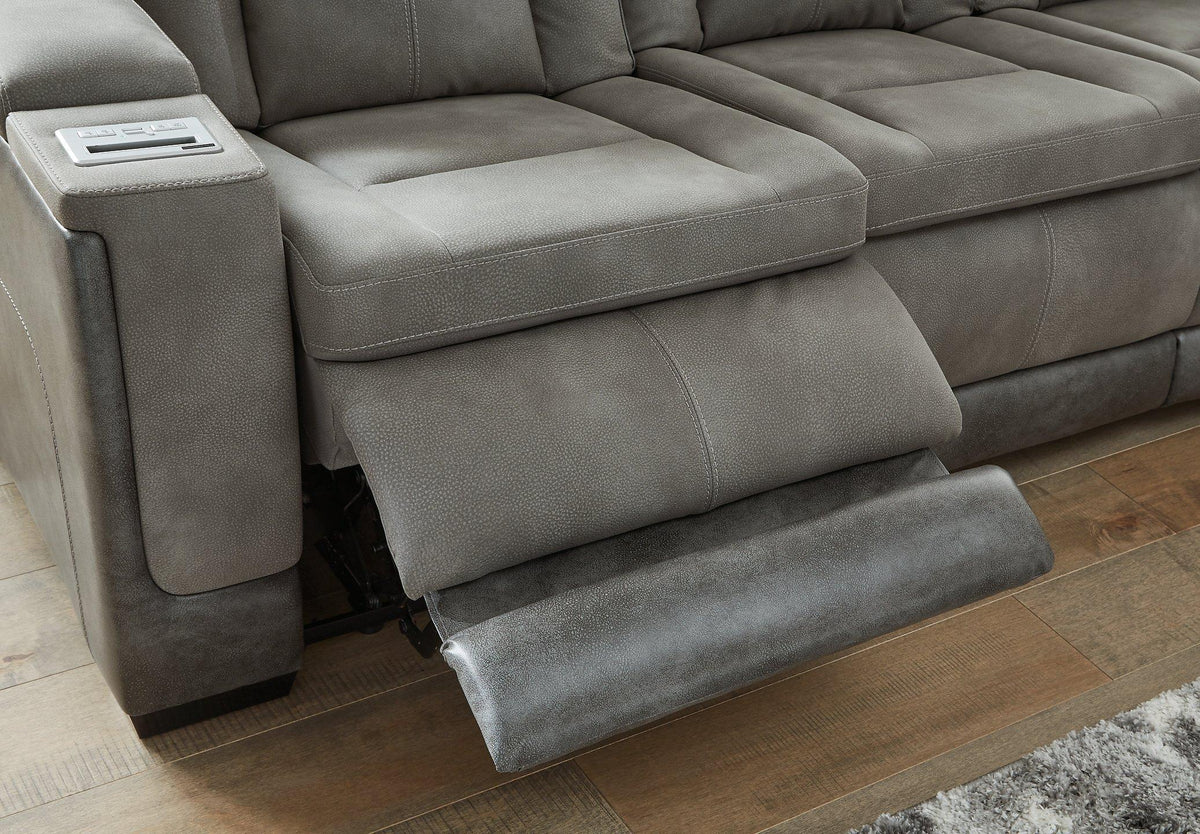 Next-Gen DuraPella Power Reclining Sofa by Ashley Furniture featuring plush cushions and modern design in a neutral fabric.
