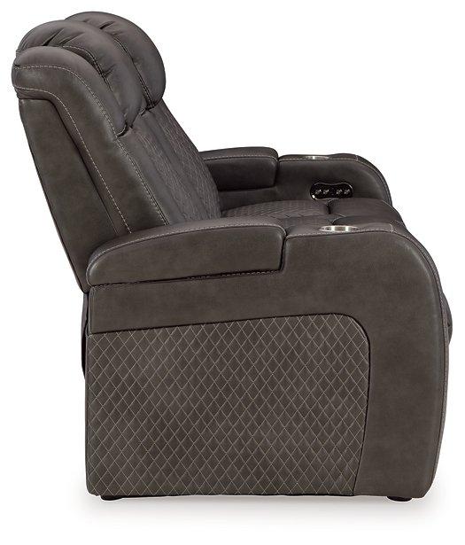 Ashley Furniture Fyne-Dyme Power Reclining Sofa with plush cushions and reclining features, in a modern fabric finish.