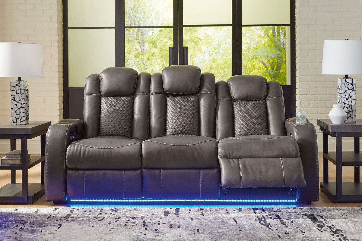 Ashley Furniture Fyne-Dyme Power Reclining Sofa showing plush gray upholstery and powered reclining features.