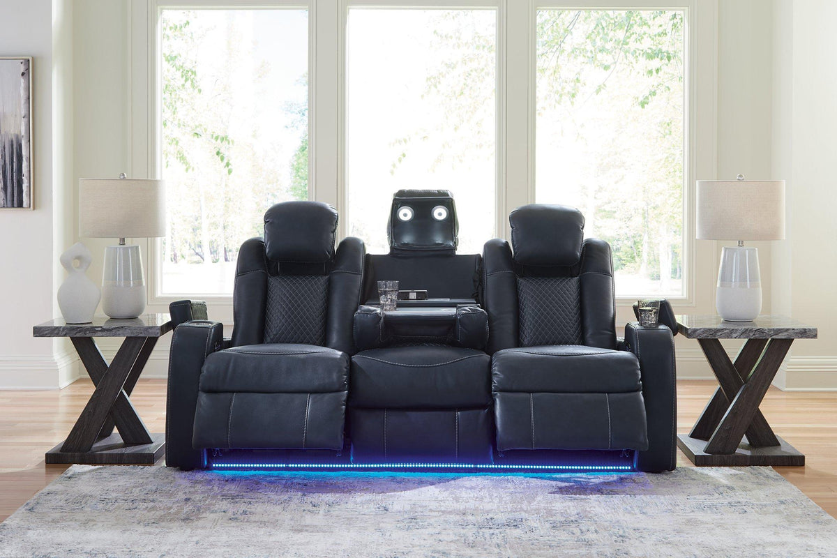 Ashley Furniture Fyne-Dyme Power Reclining Sofa with plush cushions and reclining features, shown in a modern living room setting