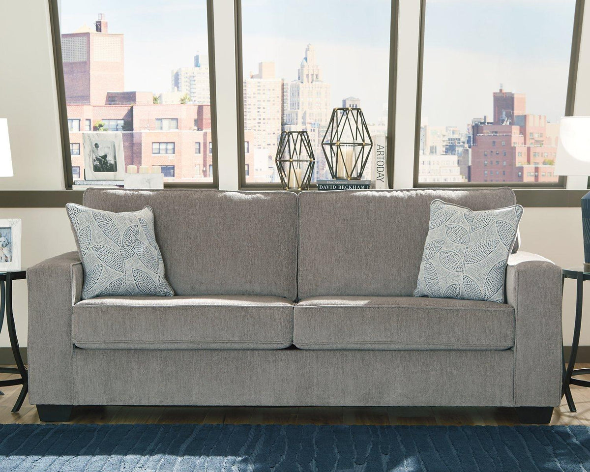Ashley Furniture Altari sofa featuring plush cushions, neutral fabric upholstery, and a modern design for stylish living rooms.