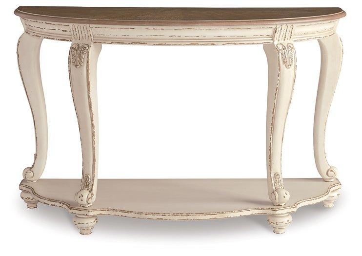 Ashley Furniture Realyn sofa table with a sleek wooden design and spacious top, perfect for living room decor.