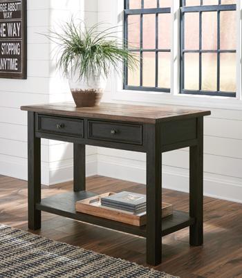 Ashley Furniture Tyler Creek sofa table with a sleek wooden console design, perfect for living room decor.