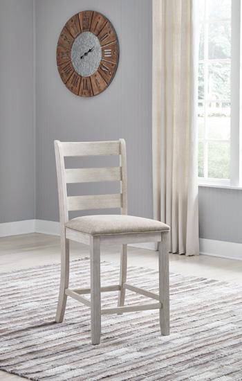 Ashley Furniture Skempton counter height bar stool with wooden legs and upholstered seat, ideal for kitchen or bar area.
