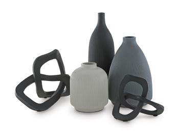 Set of five Ashley Furniture Leithick table accessories, including coasters, placemats, and decorative pieces on a wooden table.