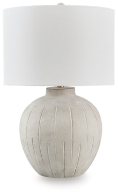 Ashley Furniture Calbert Table Lamp with a sleek design, featuring a fabric shade and modern base for stylish lighting.