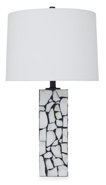 Macaria table lamp by Ashley Furniture with a sleek base and fabric shade, ideal for modern home lighting.
