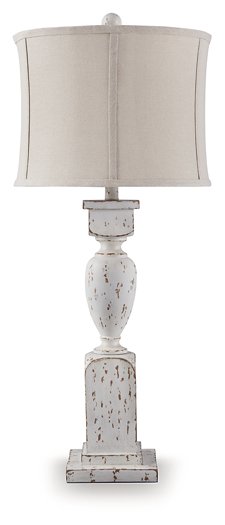 Ashley Furniture Madsbrook table lamp with a classic design, featuring a beige fabric shade and wooden base.