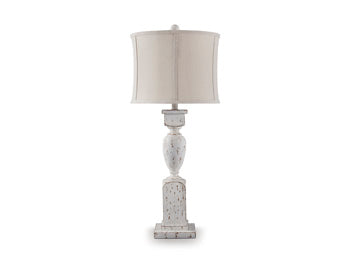 Ashley Furniture Madsbrook table lamp with a sleek base and fabric shade, perfect for living room or bedside lighting.