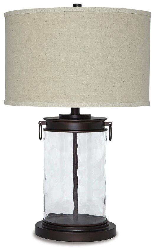 Tailynn table lamp by Ashley Furniture featuring a modern design with a sleek base and fabric shade.