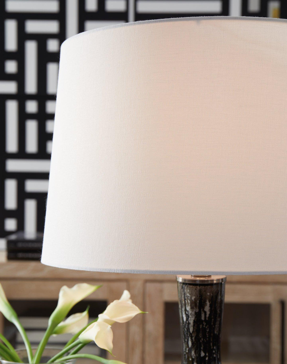 Ashley Tenslow table lamp with a sleek base and fabric lampshade, ideal for modern living room or bedside decor.