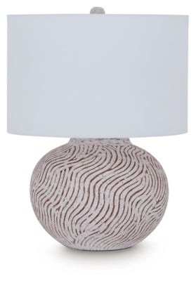 Decorative Ashley Furniture Vien Table Lamp with a sleek base and fabric shade, ideal for adding style to a living space.