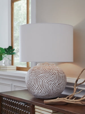 Ashley Furniture Vien table lamp with a sleek design and fabric shade, ideal for home decor and bedside or living room use.
