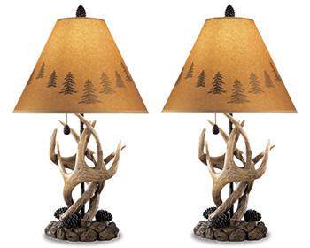 Pair of Ashley Furniture Derek Table Lamps with fabric shades, featuring a modern design and warm lighting.