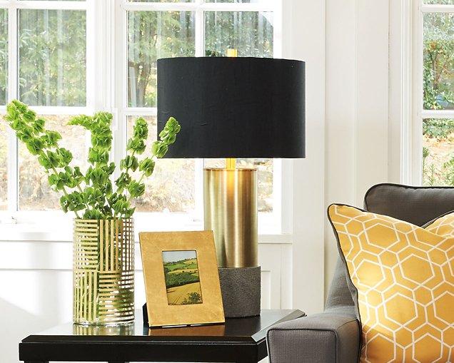 Pair of Jacek table lamps by Ashley Furniture with beige fabric shades and wooden bases, ideal for bedroom or living room decor.