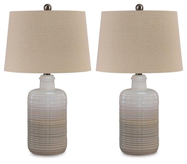 Pair of Marnina table lamps by Ashley Furniture, featuring elegant bases and fabric shades, perfect for bedside or living room decor.