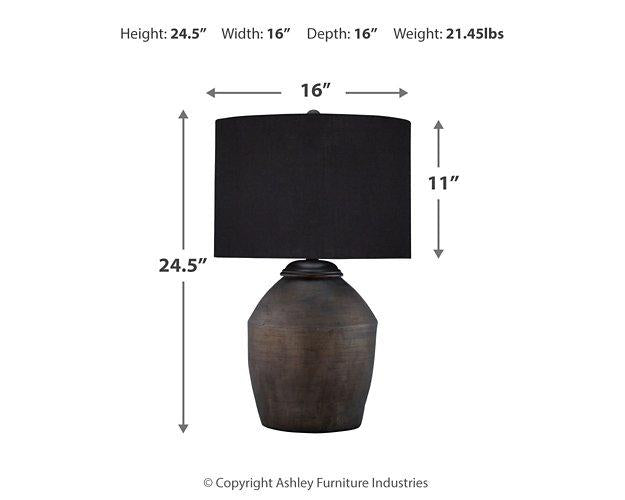 Naareman table lamp set by Ashley Furniture, featuring two stylish lamps with modern bases and fabric shades on a wooden surface.
