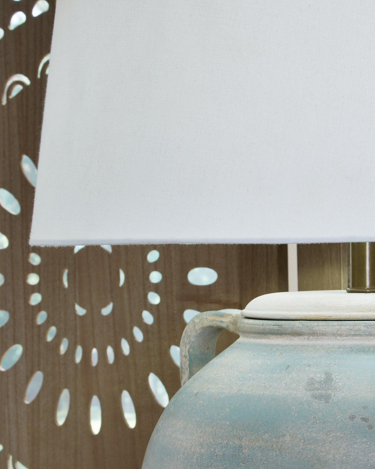 Ashley Furniture Shawburg table lamp set featuring two elegant lamps with neutral-colored shades and modern bases.