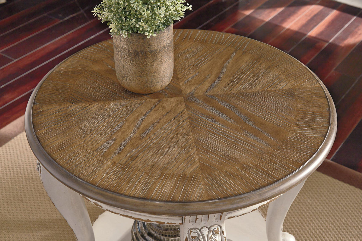 Ashley Furniture Realyn Table Set featuring a modern dining table with matching chairs in a stylish wood finish.