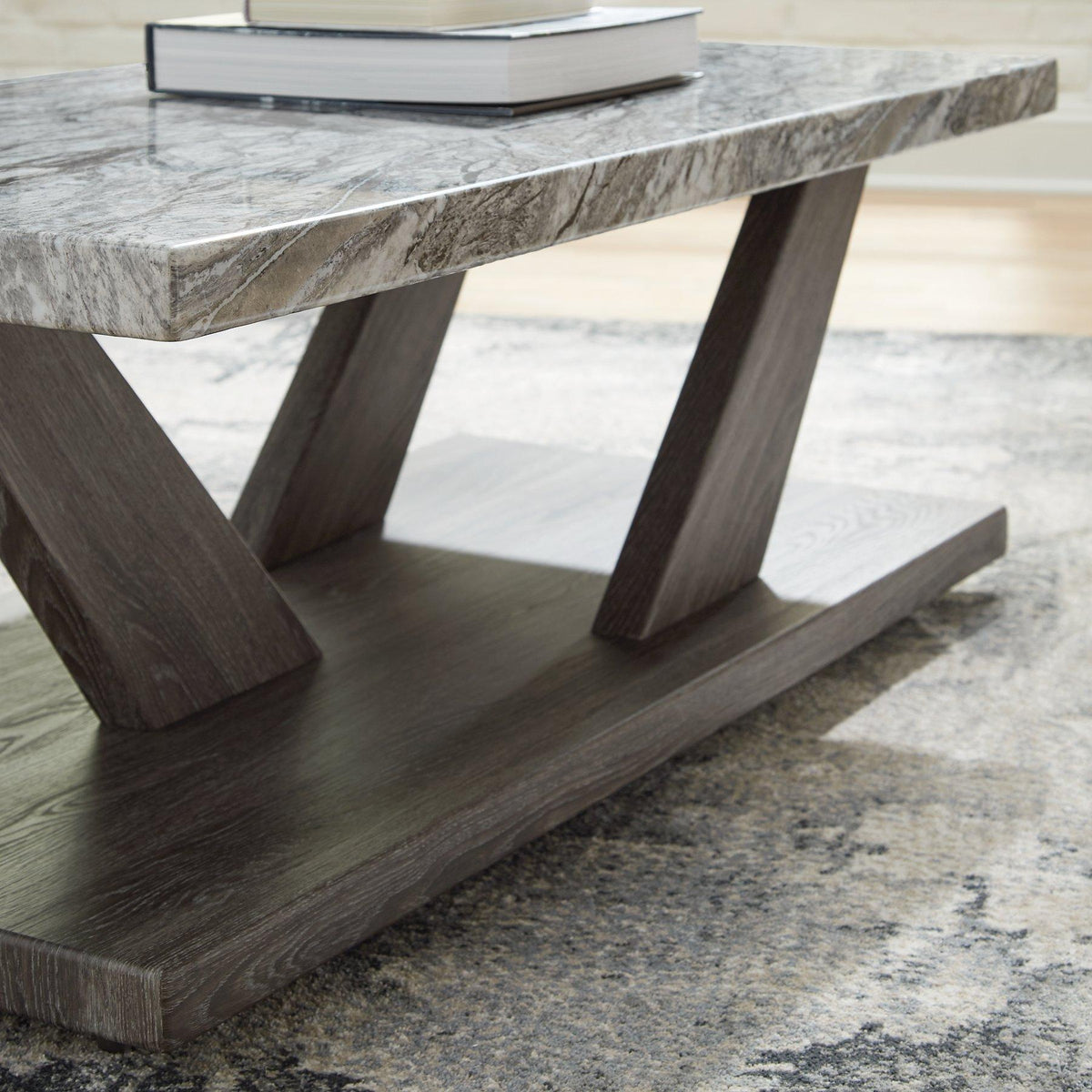 Set of three Bensonale tables from Ashley Furniture, featuring modern wooden tabletop designs and sleek black metal legs.