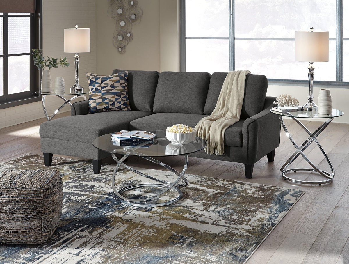 Set of three Ashley Furniture Hollynyx tables, stylish modern table set with sleek wooden surfaces and contemporary design.