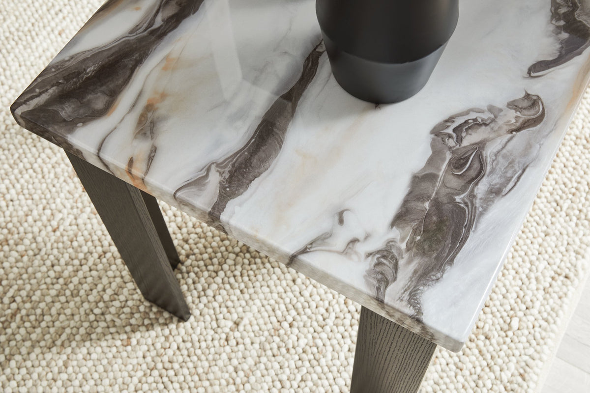 Set of three Ashley Furniture Jazmore tables, featuring modern wooden tops and sleek metal legs, arranged together.