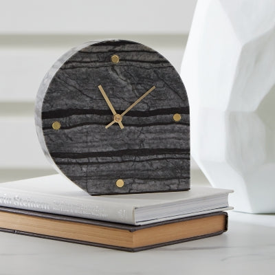 Pair of Ashley Furniture Janmour table clocks, stylish tabletop accessories with modern design, set on a wooden surface.