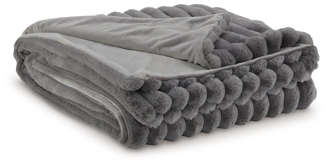 Set of three Ashley Furniture Alsonwell throws with soft, cozy fabric perfect for home decor and lounging.