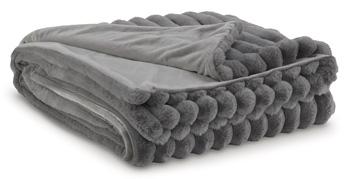 Set of three Ashley Furniture Alsonwell throws with cozy, textured fabric perfect for adding warmth and style to living spaces.