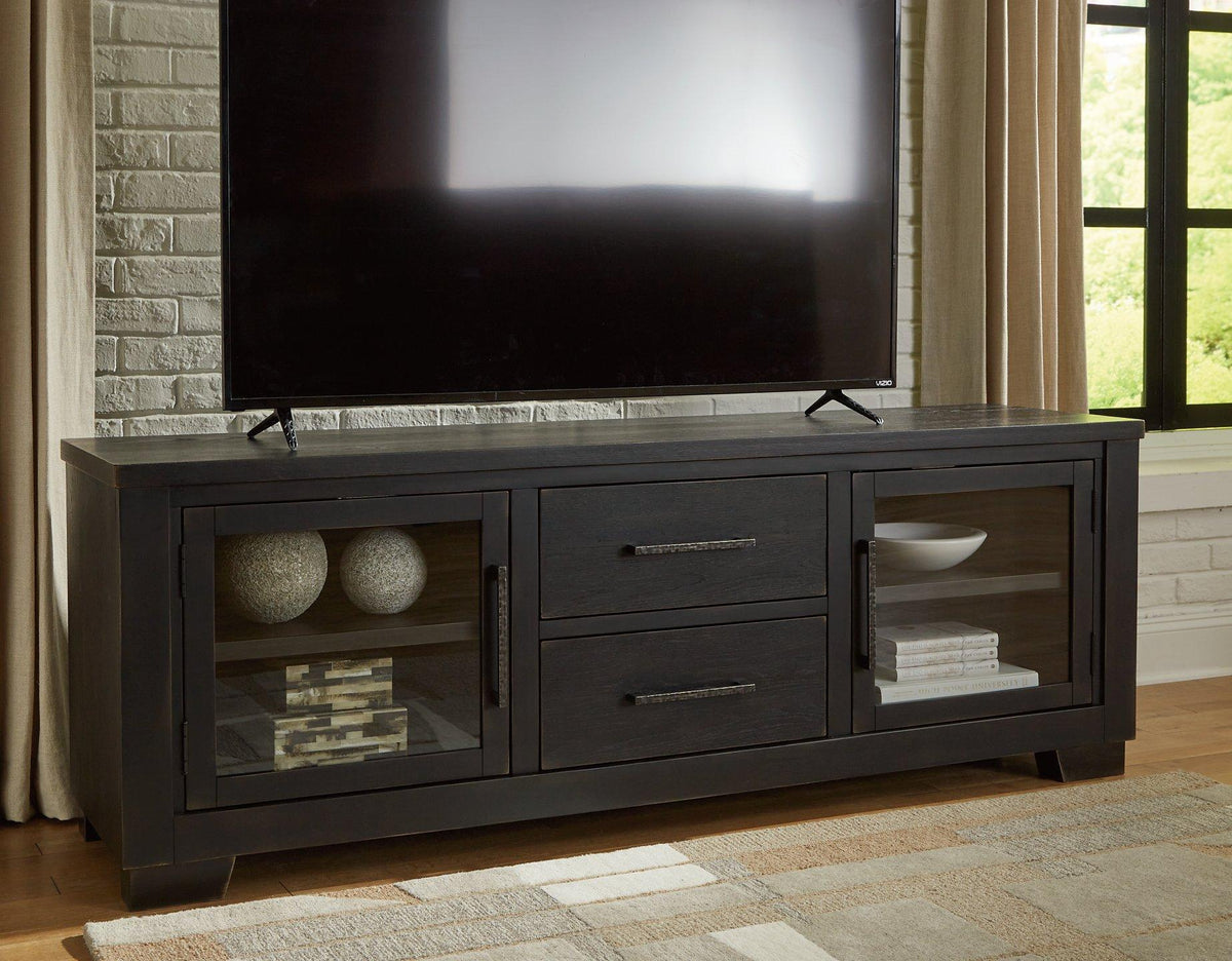 Ashley Galliden 80-inch TV stand with open shelving and storage compartments in a modern wood finish.