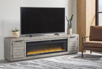 Naydell 92-inch TV stand by Ashley Furniture with built-in electric fireplace and wooden finish, designed for modern living rooms.