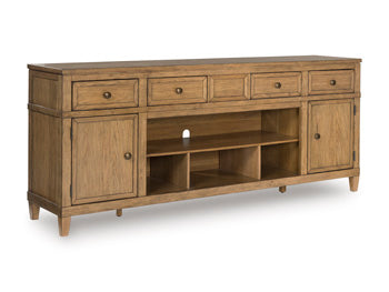 Ashley Furniture Sharlance 81-inch TV stand with open shelving and closed cabinets, finished in a dark wood tone.