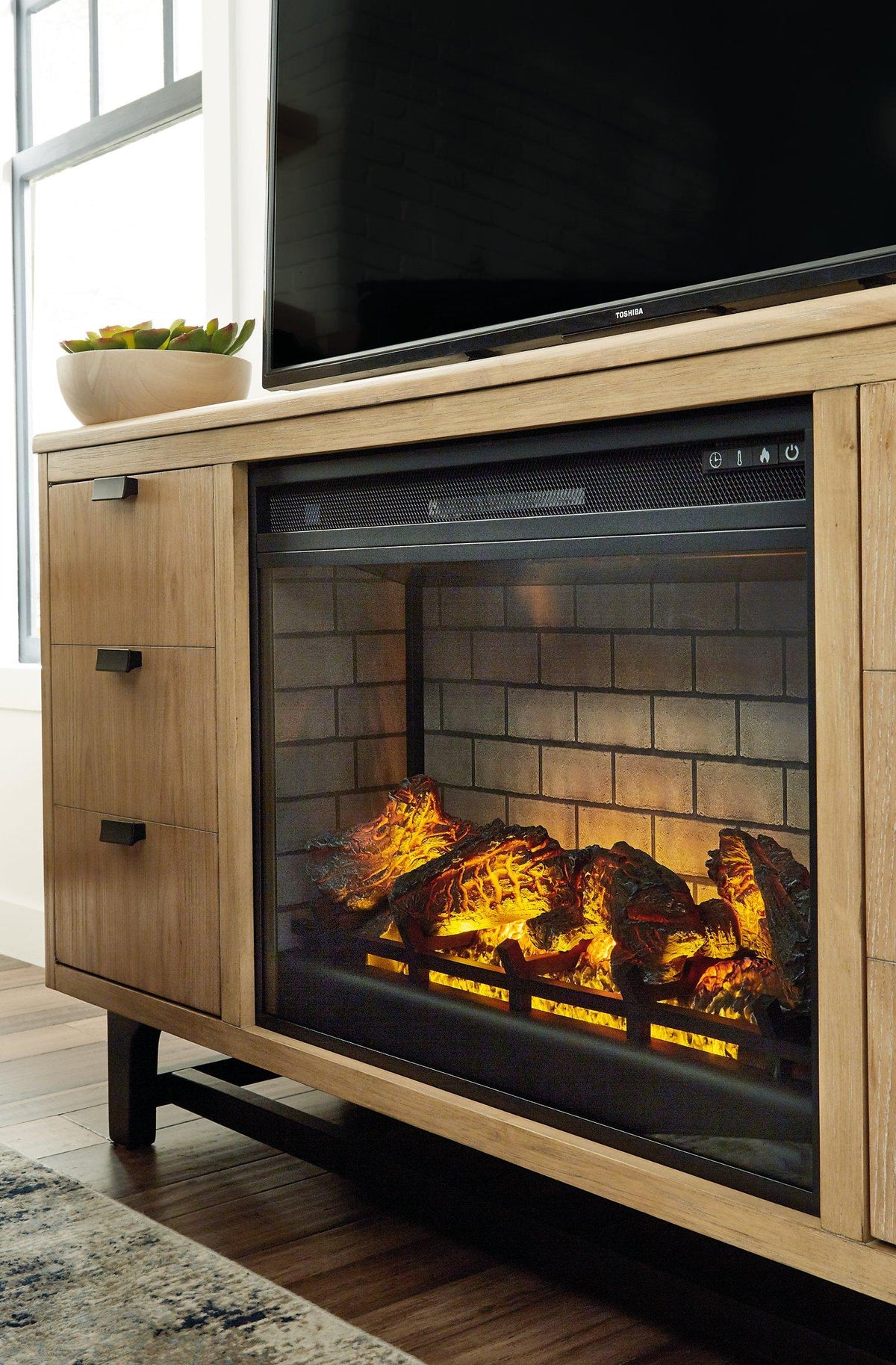 Wittenmyer 72-inch TV stand with built-in electric fireplace by Ashley Furniture, featuring a modern design and multiple storage compartments