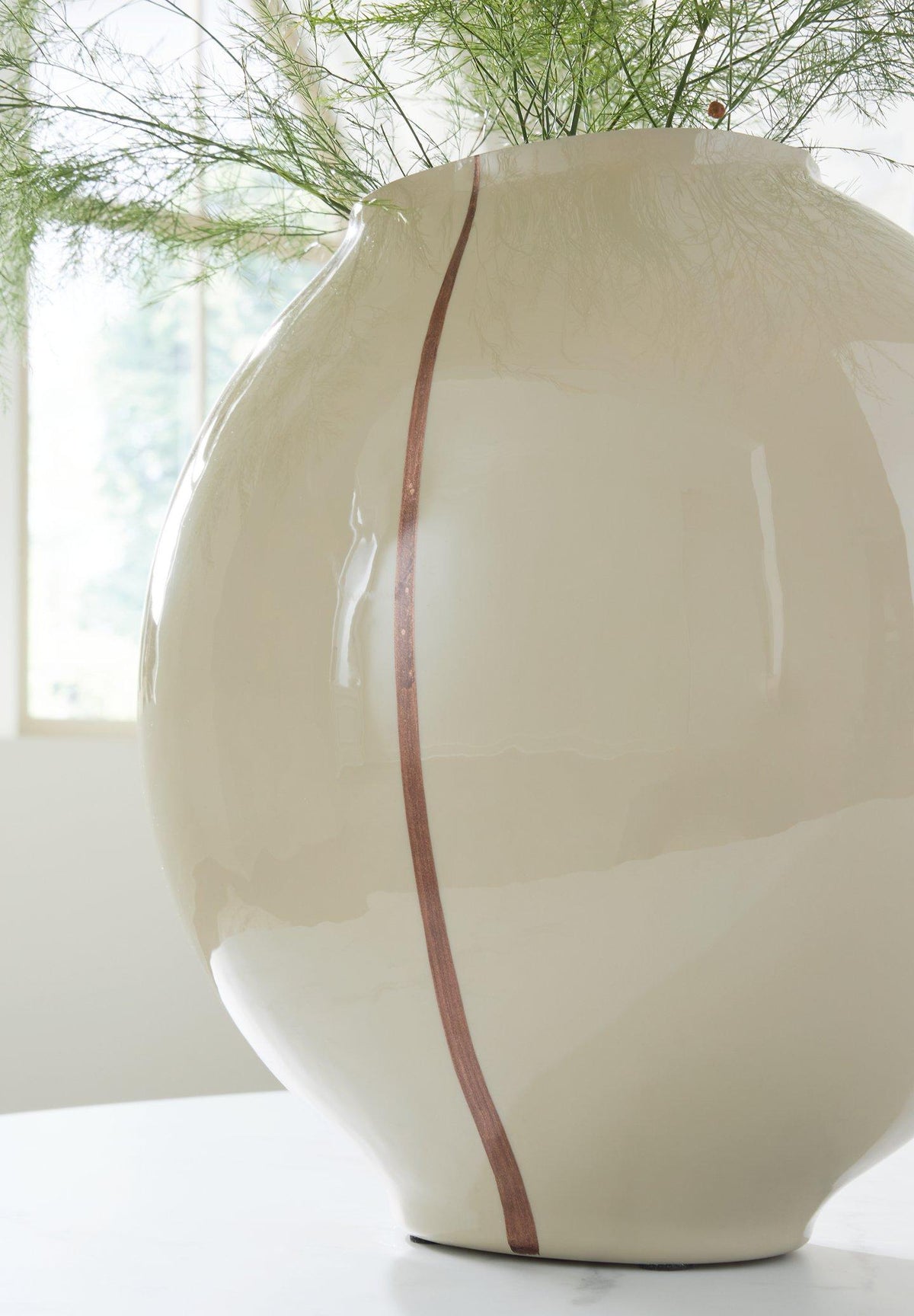 Sheabourne Vase by Ashley Furniture featuring a sleek, modern design with a glossy finish and elegant shape.