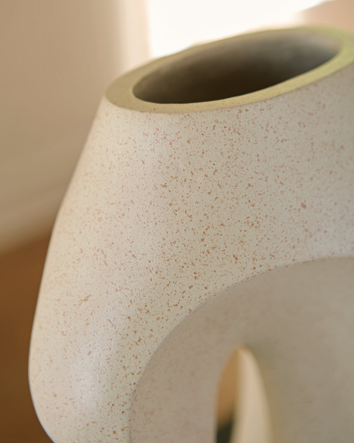 Ashley Furniture Odion vase with a sleek, modern design and textured finish, perfect for home decor accents.