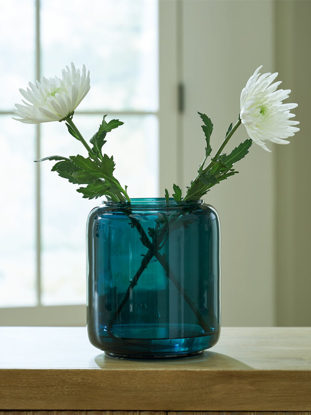 Ashley Furniture Inisland Vase, decorative ceramic vase with a sleek, modern design and neutral finish, suitable for home decor.